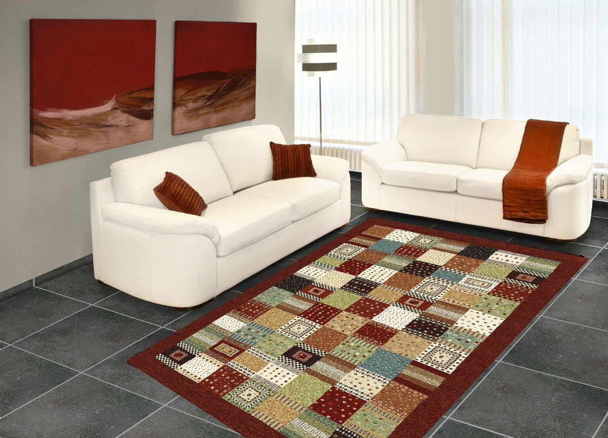 Family living room with a patchwork rug on a tiled floor