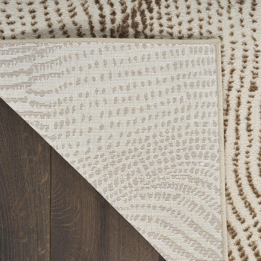 DKNY Central Park West Swirl Beige Brown Rug